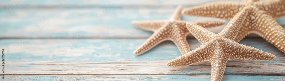 beautiful starfish on a rustic blue wooden background, evoking a serene beach atmosphere. beautiful starfish on a rustic blue wooden background, evoking a serene beach atmosphere.