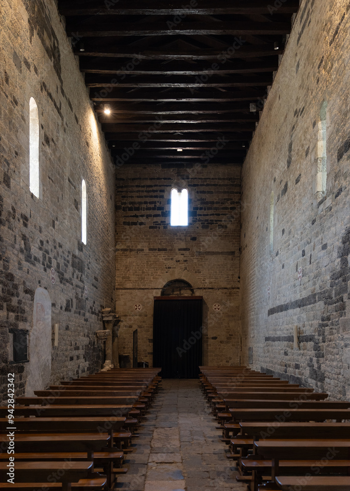 Fototapeta premium Interior of the Basilica of the Holy Trinity of Saccargia of Saccargia with no people, a famous romanesque church in Sassari in Sardinia, Italy.
