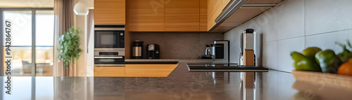 Modern Kitchen Countertop with Wood Cabinets and Stainless Steel Appliances - Interior Design Photo