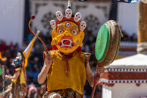 A young Buddhist monk dressed in traditional costume beating drum at Hemis Monastery during Hemis festival at Leh, Ladakh India on 17 June 2024.