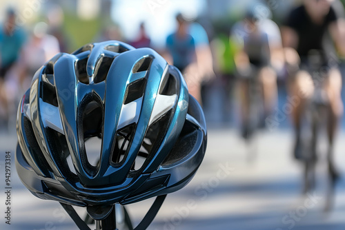 A close-up of a bike helmet highlights cyclists riding together on a bustling path during daylight. The atmosphere is energetic and vibrant, showcasing active transportation photo