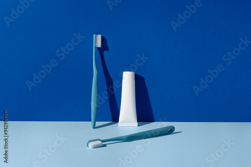 Modern dental hygiene products on a blue background