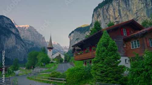 Wallpaper Mural Lauterbrunnen, Switzerland. Strolling through the incredible views of a famous Swiss village with a waterfall in the Alps Torontodigital.ca