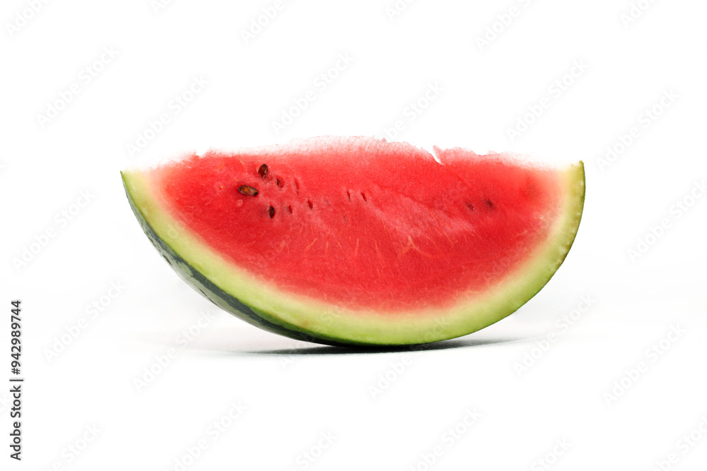 A watermelon cut in half with a single slice removed, isolated on a white background A watermelon cut in half with a single slice removed, isolated on a white background