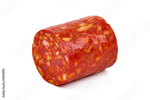 Spanish pork chorizo sausage slices, close-up, isolated on white background.