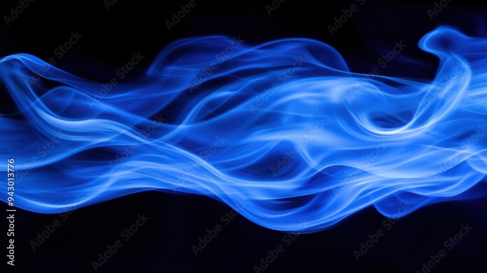 Ethereal blue smoke waves on dark background