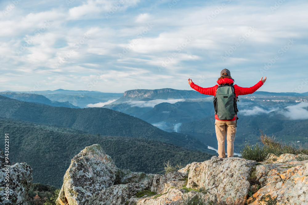 Hiker enjoys impressive views in Vilvestre, Salamanca Hiker enjoys impressive views in Vilvestre, Salamanca