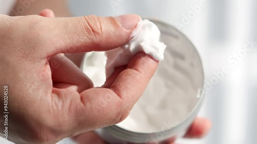 Hand cream in large plan.
A man smears his hands with cream.
Wet hands.
Dry hands.
Problems with the skin on the hands.
Palms in cream, close-up photo