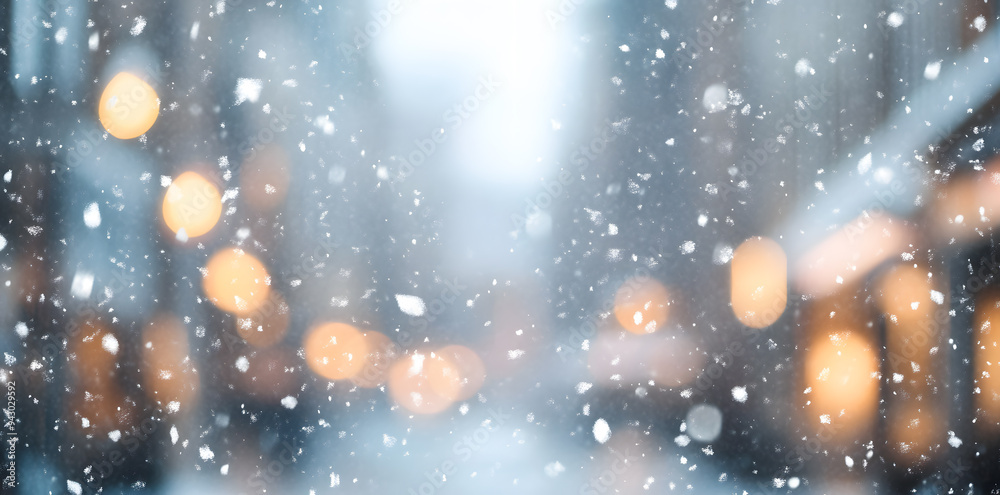 Snowfall abstract blurred light urban background Snowfall abstract blurred light urban background