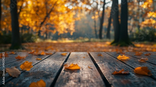 A wooden table with leaves on it