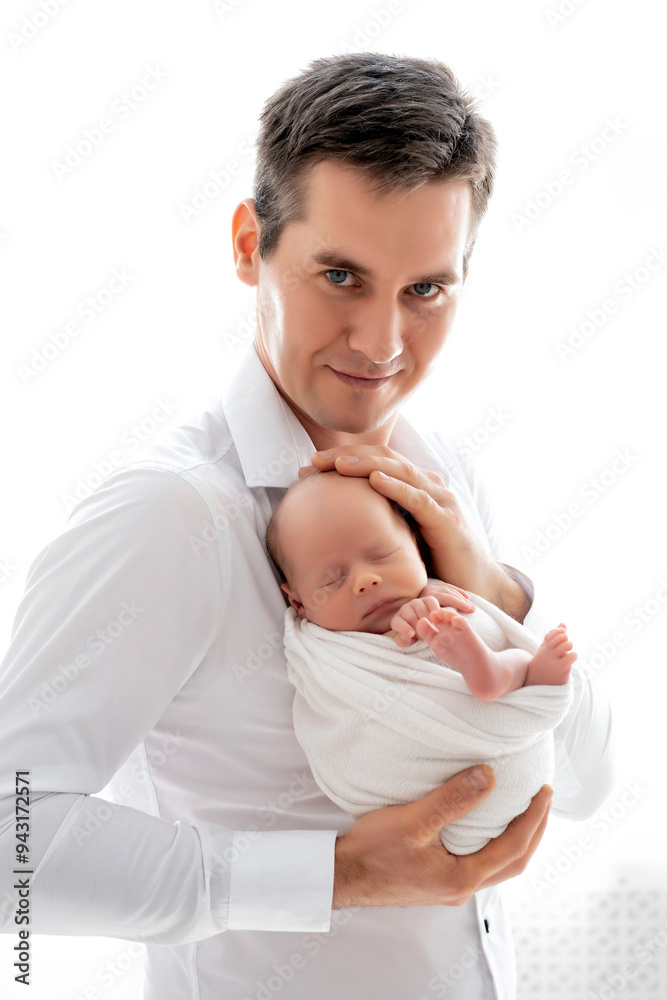 dad with a newborn baby son, dad holding the baby in his arms gently hugging and kissing him, paternal love and care, happy family, dad on maternity leave dad with a newborn baby son, dad holding the baby in his arms gently hugging and kissing him, paternal love and care, happy family, dad on maternity leave