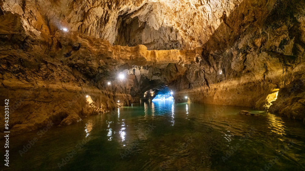 Fototapeta premium Altinbesik Cave is Turkey's largest underwater lake cave, in addition to its magnificent beauty. The cave is illuminated with colored lights. Antalya, Turkey.