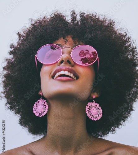 Female Middle Easterner in summer outfit laughing and smiling. photo