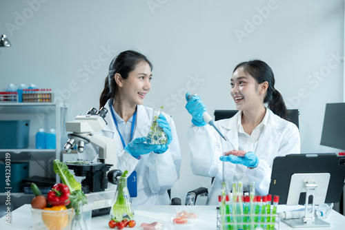 Team Microbiologists Analyzing Molecular Samples in Advanced Food Science Laboratory, Dietitian food and medicine.