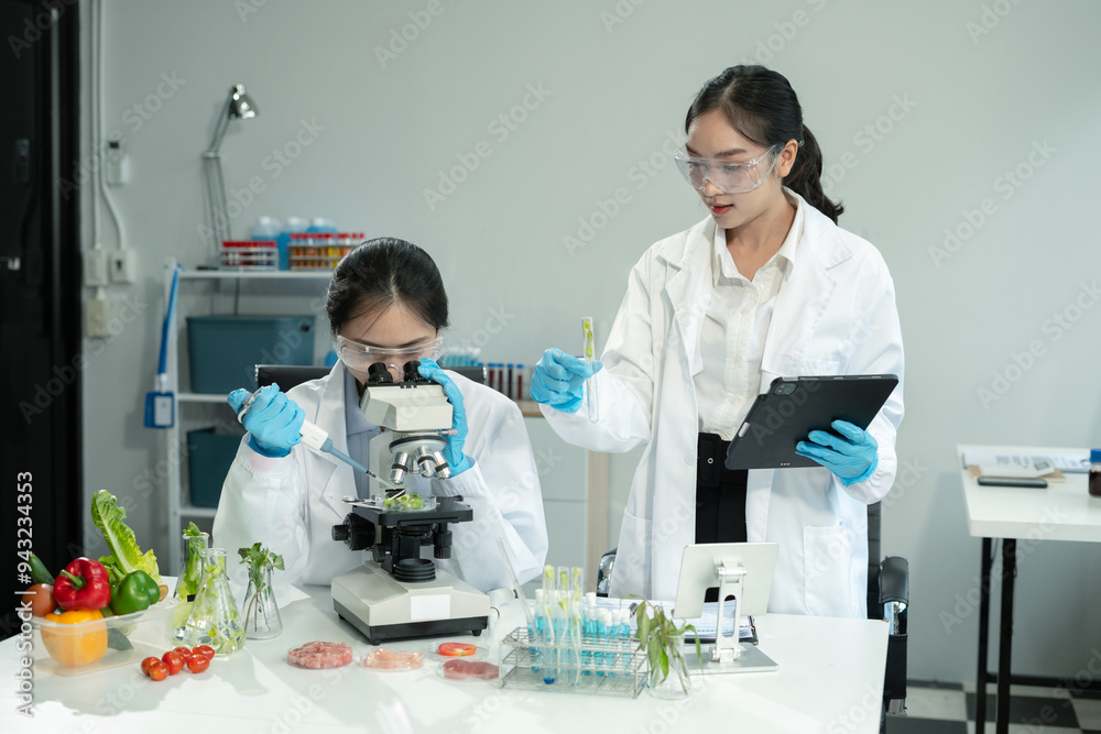 Team Microbiologists Analyzing Molecular Samples in Advanced Food Science Laboratory, Dietitian food and medicine. Team Microbiologists Analyzing Molecular Samples in Advanced Food Science Laboratory, Dietitian food and medicine.