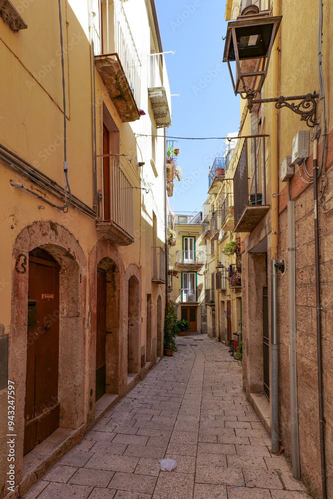 Obraz premium A street between old houses of Isernia, a city in Molise, Italy.