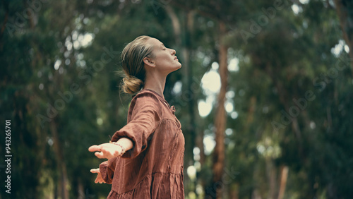 Woman breathing fresh air outdoors	