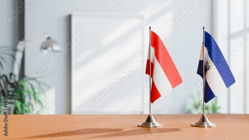 FLAGS OF AUSTRIA AND EL SALVADOR ON TABLE