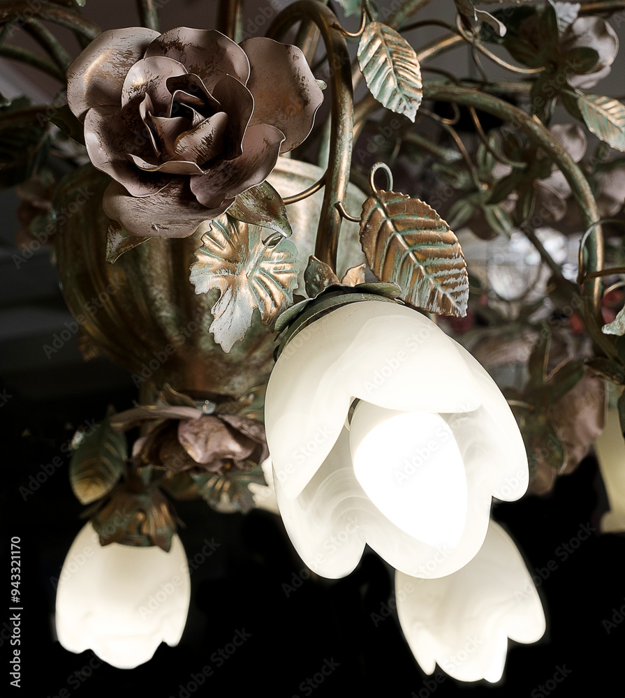 Chandelier lamp with flowers and metal, Bohemian glass Beautiful exquisite natural motifs with crystals on a black background isolate