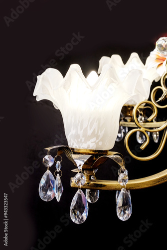 Obraz na płótnie Chandelier lamp with flowers and metal, Bohemian glass Beautiful exquisite natural motifs with crystals on a black background isolate w salonie