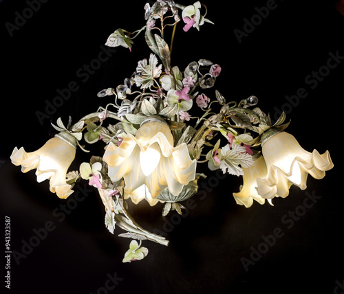 Obraz na płótnie Chandelier lamp with flowers and metal, Bohemian glass Beautiful exquisite natural motifs with crystals on a black background isolate w salonie