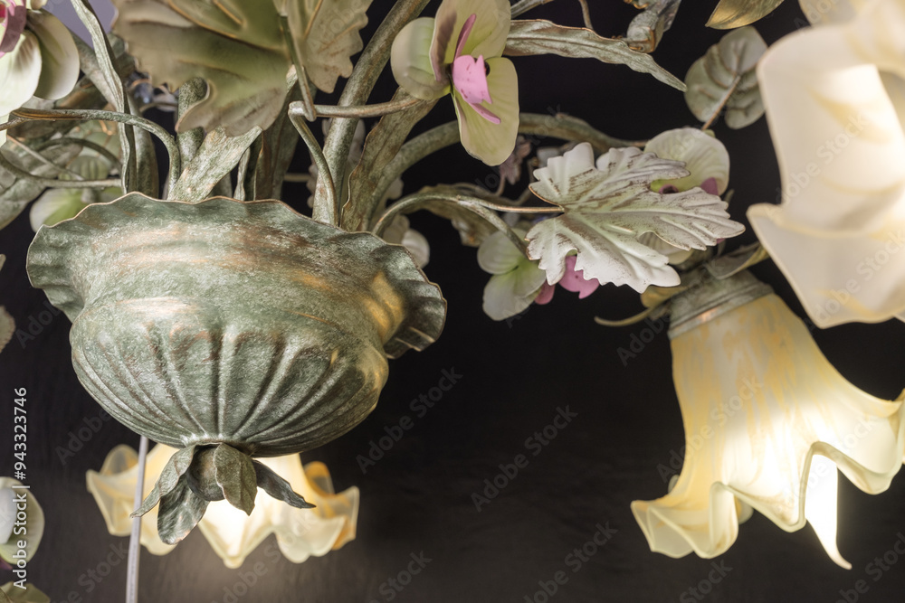 Chandelier lamp with flowers and metal, Bohemian glass Beautiful exquisite natural motifs with crystals on a black background isolate