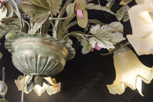 Obraz na płótnie Chandelier lamp with flowers and metal, Bohemian glass Beautiful exquisite natural motifs with crystals on a black background isolate w salonie