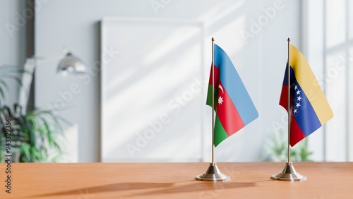 FLAGS OF AZERBAIJAN AND VENEZUELA ON TABLE photo