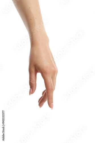 Relaxed female hand with fingers downward.