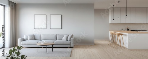  Modern living room with cozy sofa, minimalist decor, and bright kitchen featuring light wood accents and large windows.