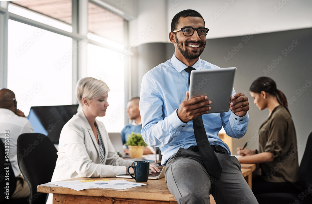 © TamJam/peopleimages.com - Businessman, thinking and smile on tablet in office for corporate research, company website and communication. Professional, coworkers or digital tech at work for email feedback or online information