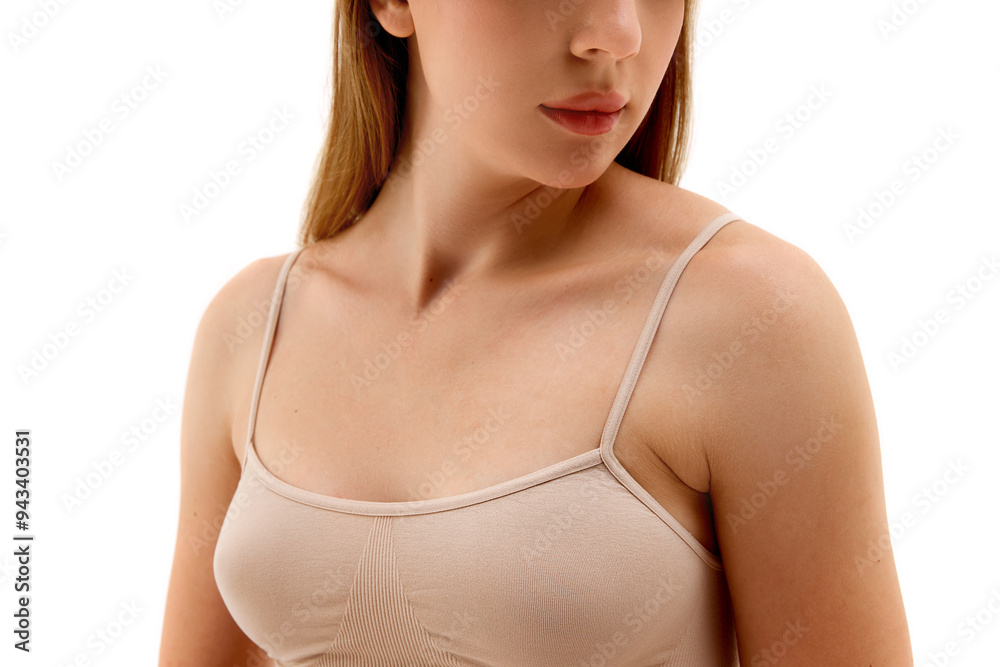 Cropped Image of female body, breast. model posing in underwear, isolated on white background. Health awareness, plastic surgery. Concept of female beauty, body and skin care, cosmetology, health Cropped Image of female body, breast. model posing in underwear, isolated on white background. Health awareness, plastic surgery. Concept of female beauty, body and skin care, cosmetology, health