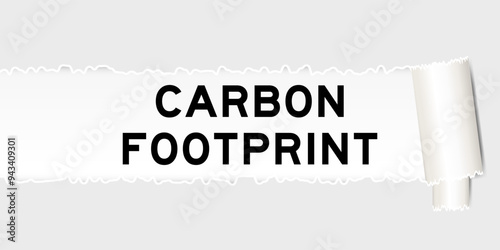 Ripped gray paper background that have word carbon footprint under torn part