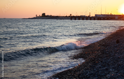 Obraz na płótnie Sea wave crashing on the shore. Sunset at sea in Sochi (Adler). w salonie