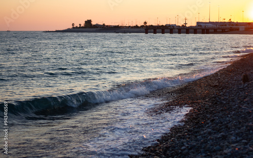 Obraz na płótnie Sea wave crashing on the shore. Sunset at sea in Sochi (Adler). w salonie