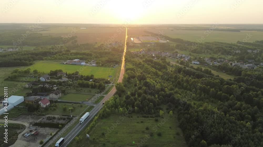 Aerial shot of straight road in countryside Aerial shot of straight road in countryside