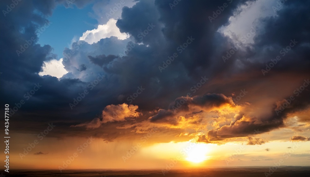 Fototapeta premium stormy sky with storm clouns on the sunset with beautiful sun