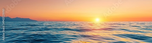 A stunning sunset over the calm ocean, showcasing vibrant colors and serene waves. Perfect for travel and nature themes.