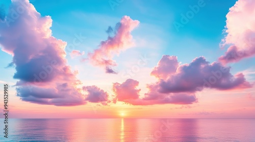 A breathtaking panorama of a sunrise over the ocean, with the sky ablaze with orange, pink, and purple hues and a dramatic cloud formation.