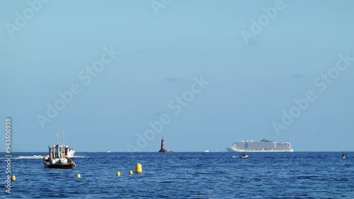 Boats moving on the sea in Vallauris, France photo