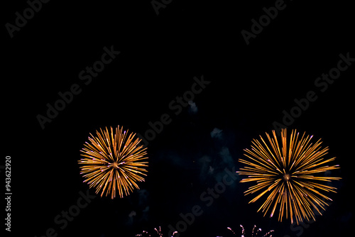 Fireworks on the dark sky background. Colorful fireworks from Loto Quebec in Quebec city, Canada. Abstract colored firework background with free space for text. fireworks light up the night sky