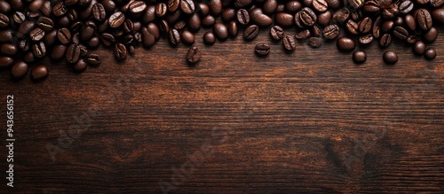 Coffee beans on a wooden su...