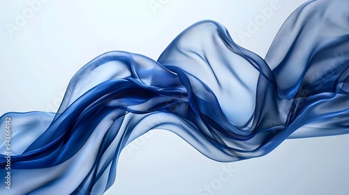 Blue Silk Fabric Flowing Gracefully in the Wind Against Minimalist Background