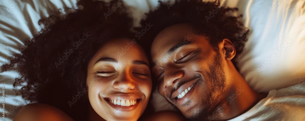Close-up of a joyful couple lying side by side in bed with peaceful expressions and warm smiles in an intimate and loving moment Close-up of a joyful couple lying side by side in bed with peaceful expressions and warm smiles in an intimate and loving moment