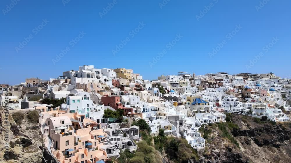 Flight around of Three Blue Domes church in Fira town - Santorini island, Greece Flight around of Three Blue Domes church in Fira town - Santorini island, Greece