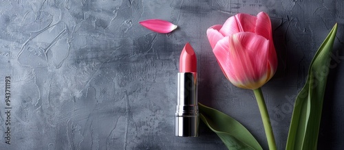 Pink lipstick alongside a t...