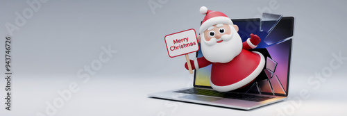 santa claus coming out from the laptop holding merry christmas sign board with plain background  photo