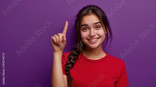 The smiling woman pointing up.