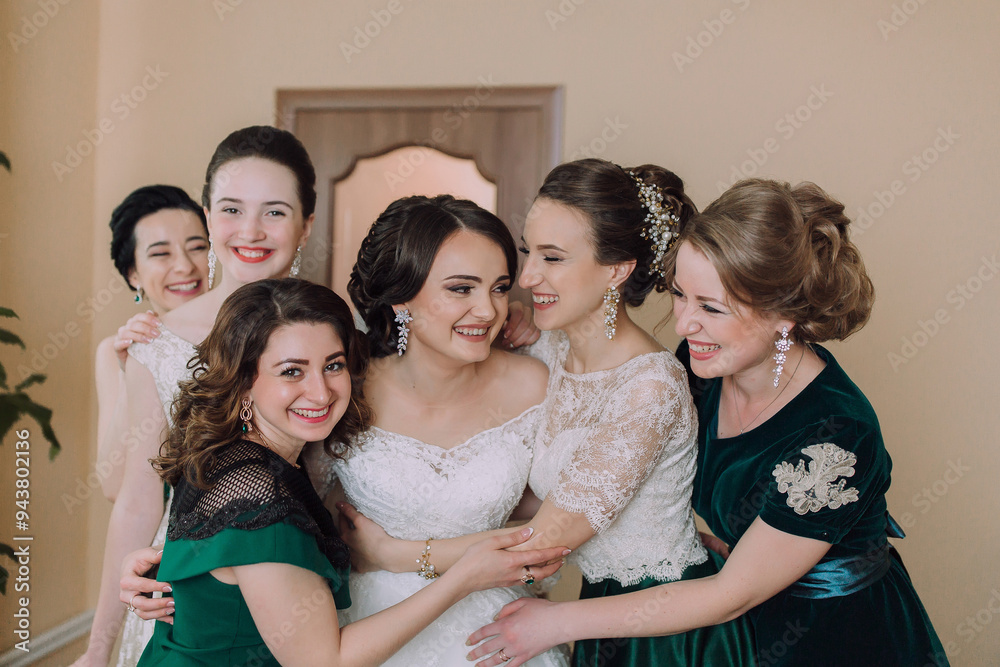 A group of women are hugging each other, with one of them wearing a wedding dress. Scene is warm and friendly, as the women are enjoying each other's company A group of women are hugging each other, with one of them wearing a wedding dress. Scene is warm and friendly, as the women are enjoying each other's company