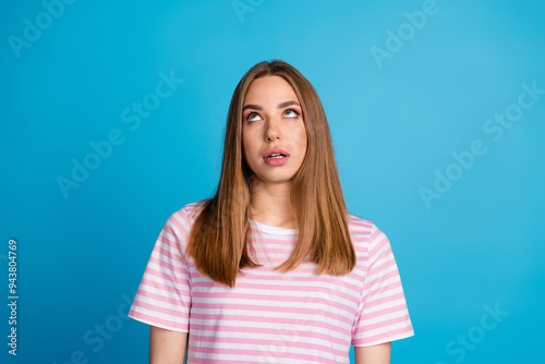 Photo of stressed depressed cute woman wear trendy pink clothes look empty space isolated on blue color background